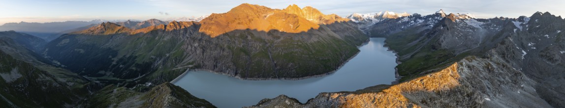 Alpine panorama with Pigne d'Arolla, Lac de Dix, sunset in the mountains, reservoir, Valais Alps,