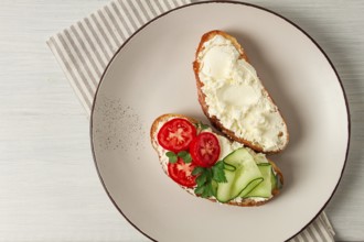 Sandwich, with cream cheese, homemade, on a cutting board, rustic style, no people, selective