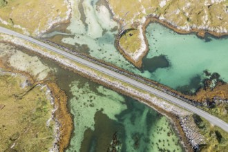 Aerial view of road on a dam connecting islands at the norwegian coast, Norway, Europe
