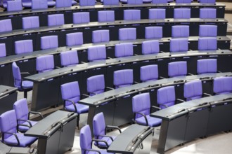 Empty plenary chamber in the German Bundestag, equipped with office swivel chairs in the special