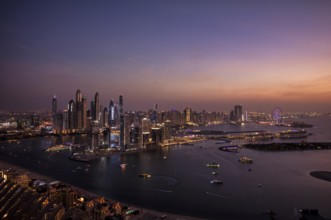Night shot, view from The View At the Palm viewing platform of skyline with Princess Tower, Elite