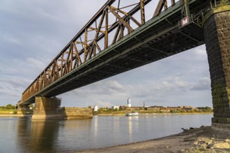 The railway bridge Duisburg-Hochfeld-Rheinhausen, over the Rhine, regional trains and many goods