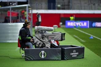 TV camera, cameraman, UEFA Conference League logo, Voith-Arena, Heidenheim, Baden-Württemberg,