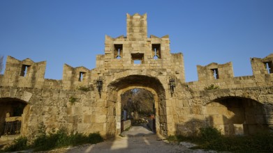Ancient stone gate of a ruin with clear blue sky in the background, Tor Tor of Saint Paul, harbour