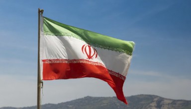 Flag, the national flag of Iran flutters in the wind