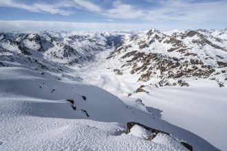 View from the summit of Piz Grialetsch in winter, mountain panorama with Dürrboden valley and view