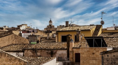 View of Mediterranean houses, roofs and courtyards from the town wall, Alcudia, Majorca, Spain,
