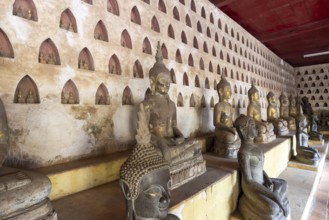 Ancient Buddha statues in the courtyard of Wat Si Saket, Vientiane, Vientiane province, Laos, Asia