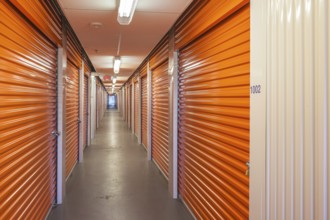 Orange interior of self storage rental units at an enclosed mini warehouse facility in Gulfport,
