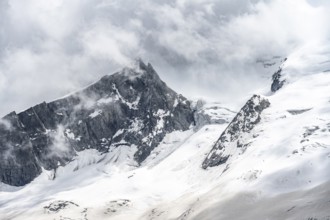 Mountain landscape of rock and ice, rocky peak between glacial ice on the Waxeggkees glacier,