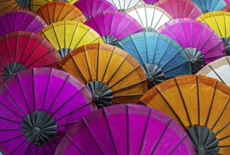 Colourful umbrellas on sale at Luang Prabang night market, Laos, Asia