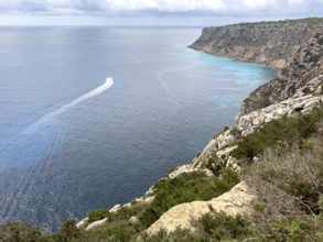 View of the rocky coast at the Far de la Mola lighthouse, eastern tip of Formentera, Balearic