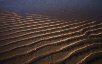 Sand ripples, wavy lines in the sand, structure, sandy beach, Meia Praia beach, Lagos, Atlantic