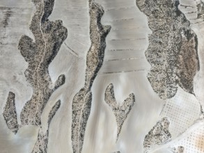 Farmland amongst rocky outcrops. Aerial view. Drone shot. Granada province, Andalusia, Spain,