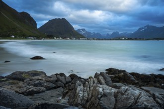 Landscape on the Lofoten Islands. The village of Ramberg, with rocks and sea and the sandy beach