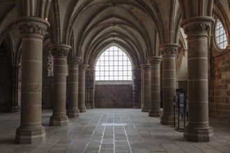 Gothic room with high columns and large windows, majestic, Le Mont-Saint-Michel