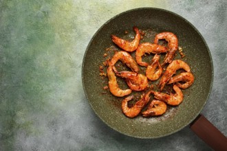 Fried tiger prawns, with spices, homemade, top view