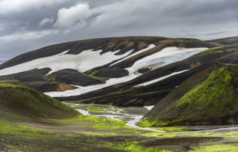 Colourful volcanic landscape with hills and snow, volcanic hot springs, Laugavegur trekking trail,