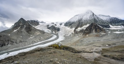 Mountain hut Cabane des Dix in front of glacier Glacier de Cheilon and summit Mont Blanc de