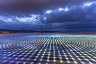 Artwork and solar installation Greeting to the sun at dusk, Zadar, Croatia, Europe