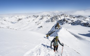 Two mountaineers with ice axe and crampons, ascent through steep snowfield to Piz Kesch or Piz