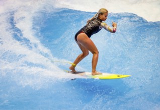 Messe boot Düsseldorf, Surfer riding a standing indoor wave on the occasion of a press event,