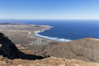 View of the coastline and the holiday homes, Mirador Ermita de las Nieves, Caleta de Famara,
