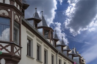 Roof bay with pointed spires on a historic inn, built in 1838, Weingasse 1, Bad Kissingen, Lower