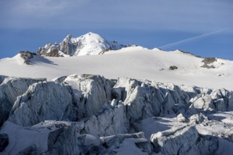 Glacier ice with crevasses, Glacier du Tour, behind summit Aiguille de Chardonnet, Chamonix,