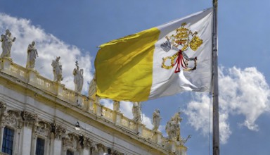 Flags, the national flag of the Vatican, Vatican State fluttering in the wind