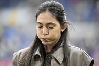 DAZN sports presenter Ann-Sophie Kimmel portrait, blows cheeks open, pressure, stress, tension,