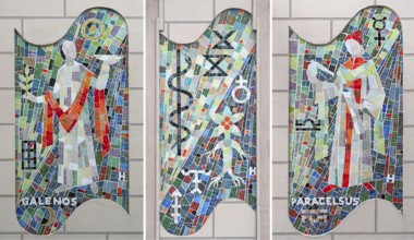 Modern mosaic pictures of Paracelsus, Galenos and an Eskolab staff, on the façade of a pharmacy,