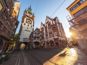 Beautiful summer sunset at the Martinstor tower in Freiburg im Breisgau, Germany, Europe