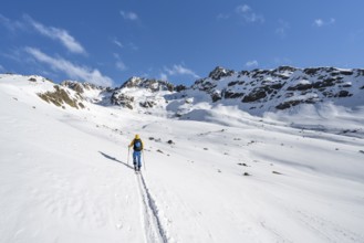 Ski tourers in a wintry mountain landscape, Bündner Haute Route ski tour, Albula Alps, Rhaetian