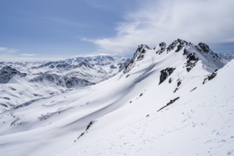 View of mountain panorama with mountain peaks of the Bernina group, mountain landscape in winter on