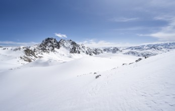View of mountain peaks of the Bernina group, mountain landscape with snow, ascent to the