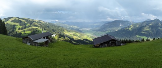 Alpine huts, view over the Brixen Valley with rainbow, Hochbrixen, Brixen im Thale, Kitzbühel Alps,