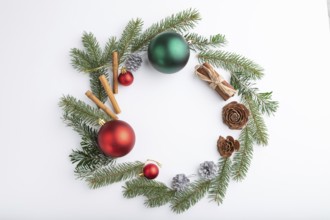 Christmas or New Year wreath composition. Decorations, balls, cones, fir and spruce branches, on