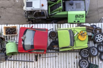 Metals are stored in a scrapyard in the harbour: scrap metal is a valuable raw material for
