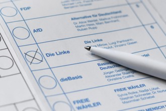Germany - February 2025: Close up of cross made for political party die Linke on ballot paper for