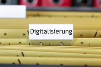 Sign with the inscription DIGITALISATION on a suspension file folder (symbolic image)
