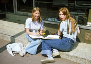 Secondary school girls doing fieldwork in geography, United Kingdom 1970s two teenagers with