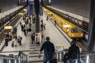 Berlin Central Station underground station. Platform with passengers on the U5 line to Hönow.