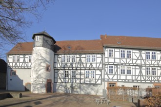 Small castle built in 1564, historic half-timbered house with oriel and turret, Rückingen,