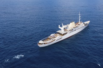Aerial view 99 metre long motor yacht Christina O, former frigate built in 1942 by Canadian