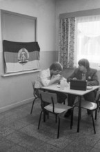 23/09/1982 GDR East Berlin Mitte district. Two tram drivers are taking a break in a canteen of the