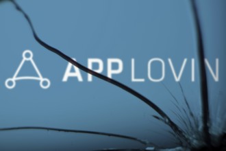 App lovin logo is visible on the broken glass. AppLovin Corporation is an American mobile