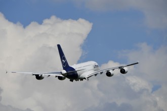 Lufthansa Airbus A380-800 taking off with blue sky and clouds, runway, Munich Airport, Upper