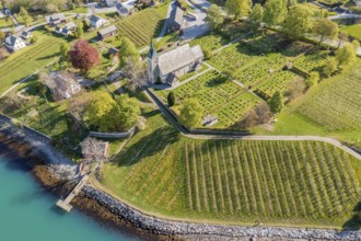Aerial view of church and apple orchards, Ullensvang near Lofthus, Hardangerfjord, Norway, Europe