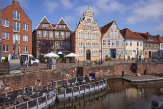 Historic half-timbered houses and gabled houses, stairs and pontoons with catering areas on the